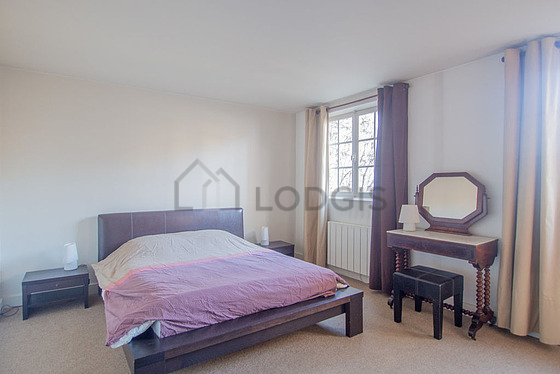 Bedroom with the carpeting floor