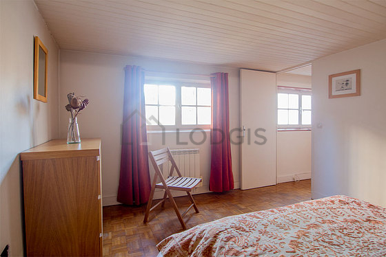 Bedroom with windows facing the courtyard