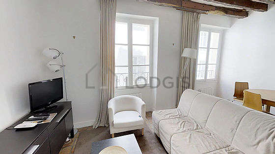 Very quiet living room furnished with 1 sofabed(s) of 140cm, tv, 2 armchair(s), 4 chair(s)
