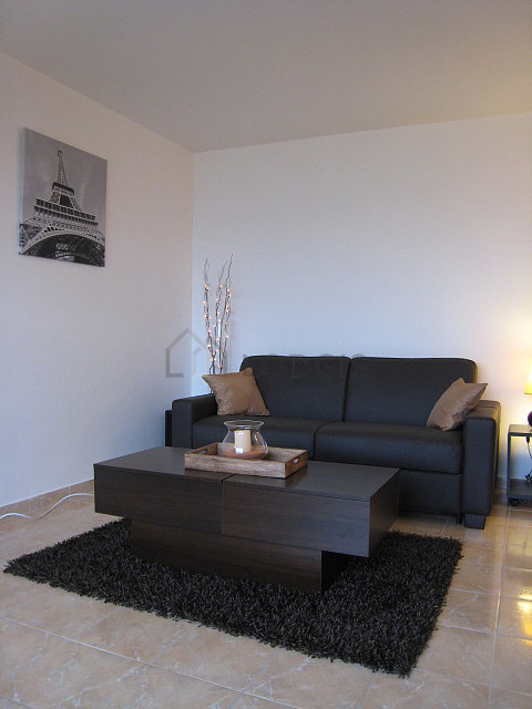 Living room with tile floor