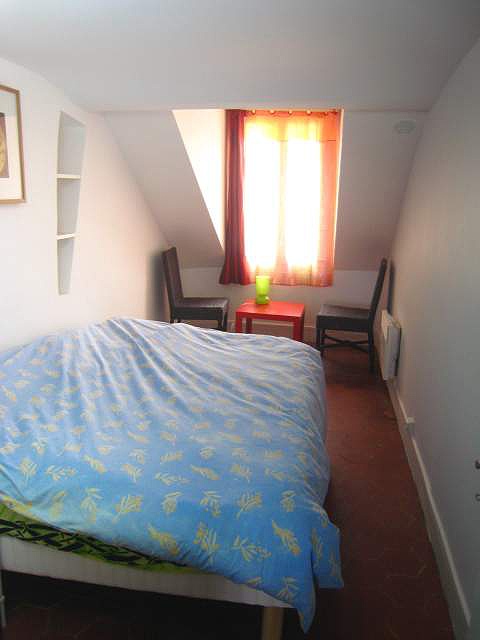 Bedroom with double-glazed windows facing the courtyard