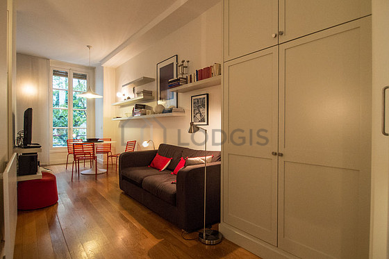 Living room with double-glazed windows facing the courtyard