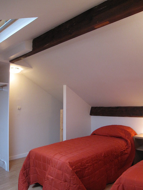 Bedroom with wooden floor