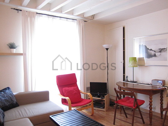 Living room furnished with 1 sofabed(s) of 140cm, tv, 1 armchair(s), 2 chair(s)