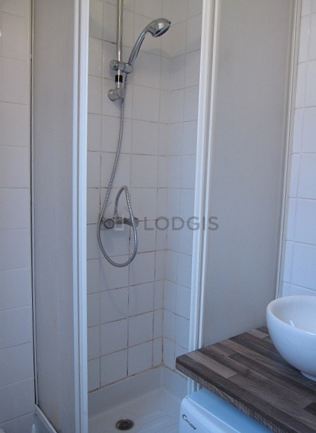 Bathroom equipped with washing machine, bath towels