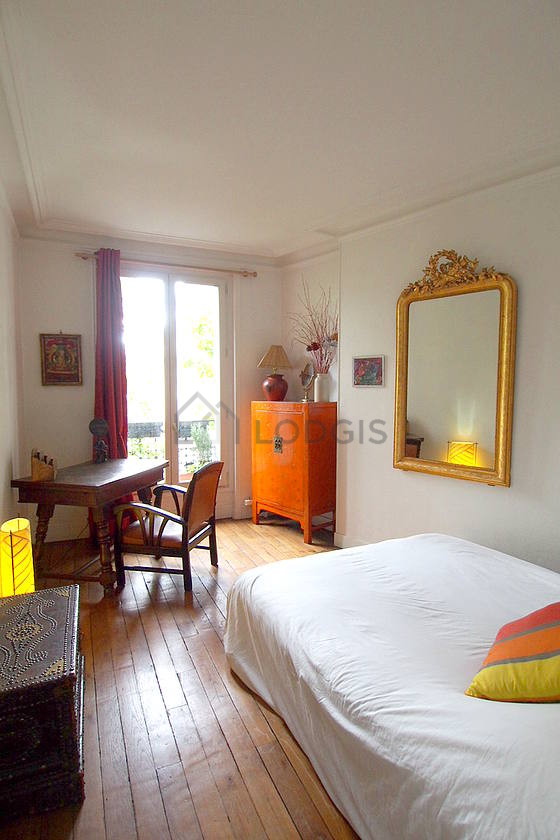 Bedroom with double-glazed windows facing the road