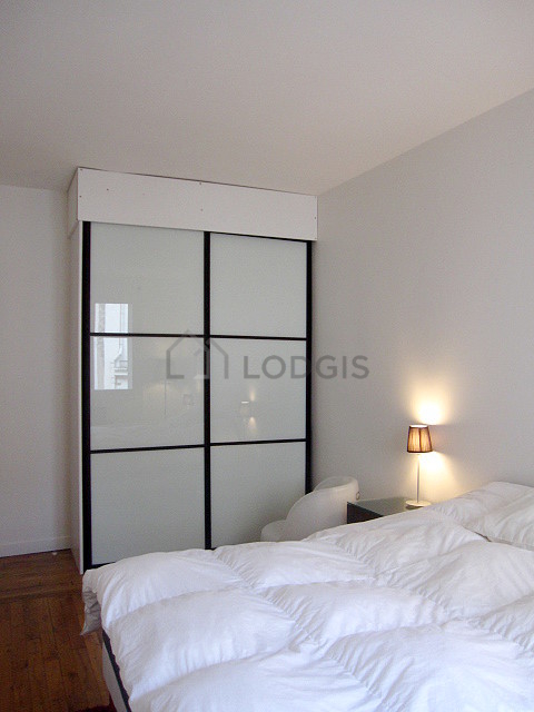 Bedroom with wooden floor