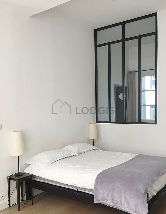 Bedroom with windows facing the courtyard