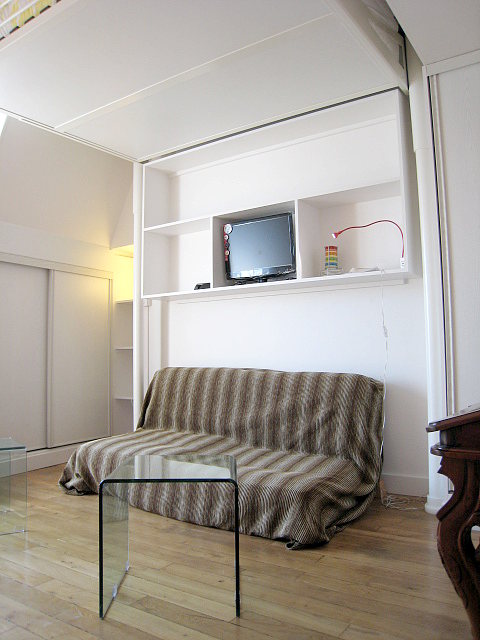 Living room with double-glazed windows facing the road