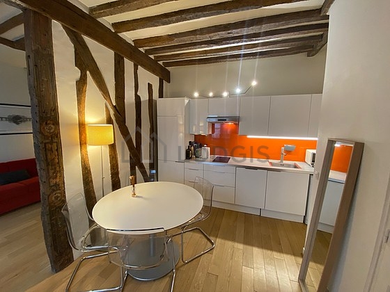Kitchen where you can have dinner for 4 person(s) equipped with washing machine, dryer, refrigerator, extractor hood