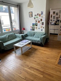 Quiet living room furnished with tv, wardrobe, cupboard