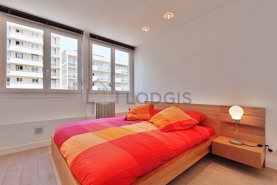 Chambre de 11m² avec du parquet au sol