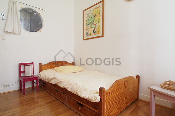 Bedroom with wooden floor