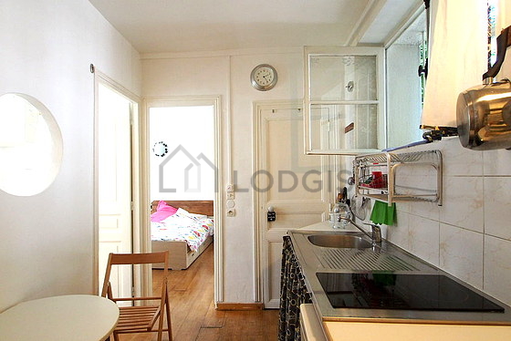 Beautiful kitchen of 8m² with wooden floor