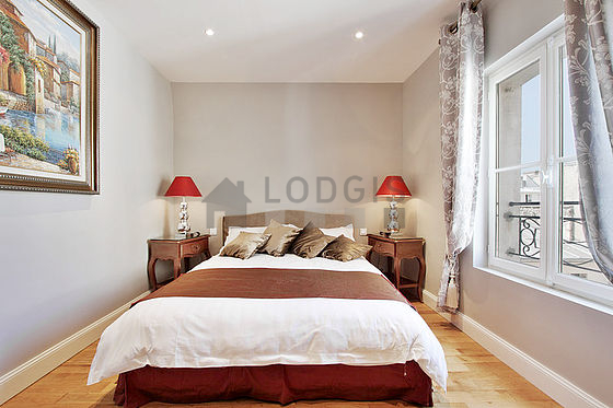 Bedroom with wooden floor