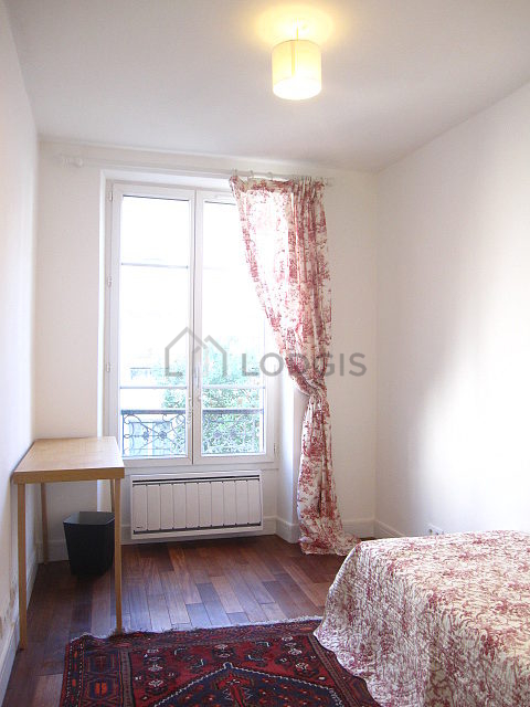 Bedroom with double-glazed windows facing the garden