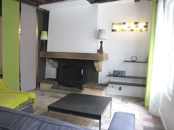 Quiet living room furnished with 1 bed(s) of 140cm, 1 sofabed(s) of 160cm, tv, wardrobe