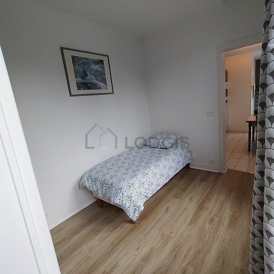 Bedroom with wooden floor