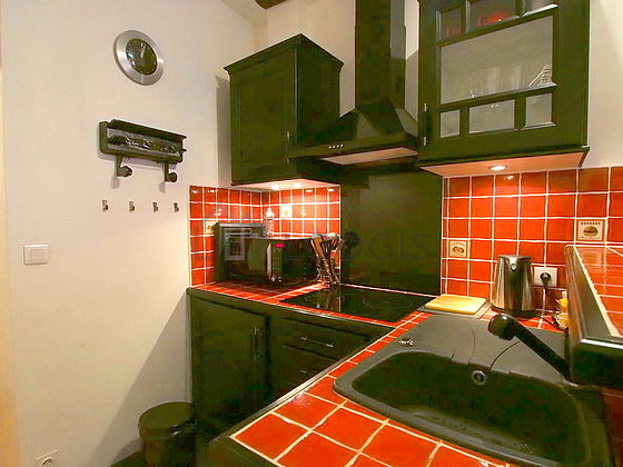 Kitchen where you can have dinner for 2 person(s) equipped with washing machine, dryer, refrigerator, freezer