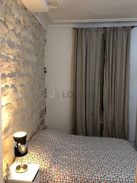 Bedroom with tile floor
