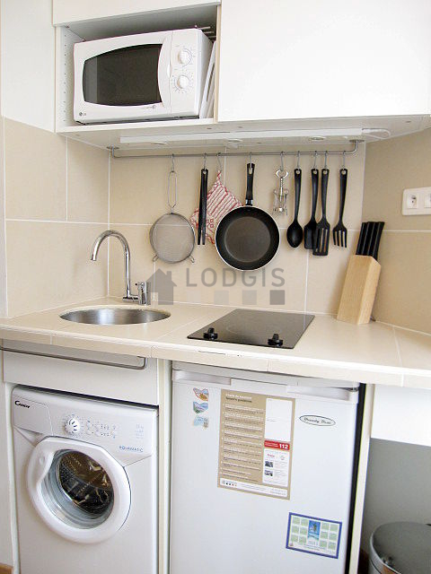 Kitchen where you can have dinner for 2 person(s) equipped with washing machine, refrigerator, freezer, crockery