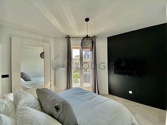 Bedroom with wooden floor