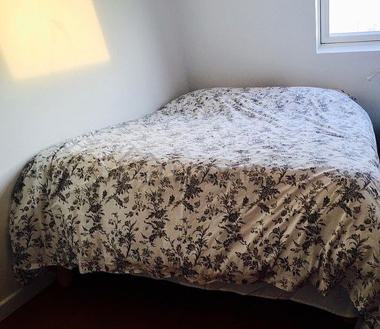 Bedroom with wooden floor