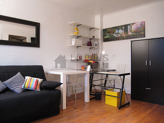 Living room with double-glazed windows facing the courtyard