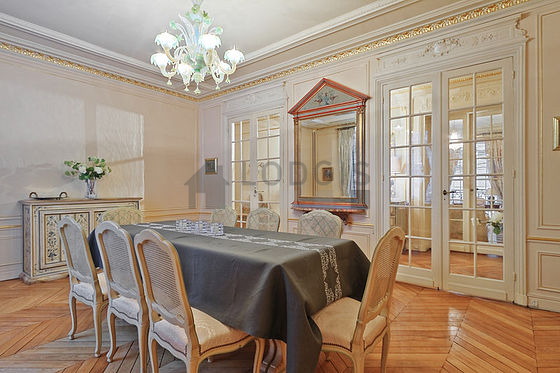 Dining room equipped with dining table, sideboard