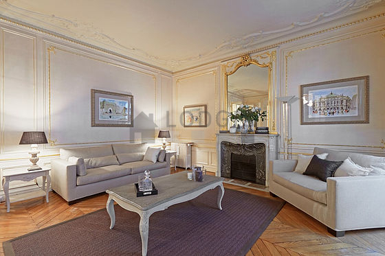 Very quiet living room furnished with tv, hi-fi stereo, storage space
