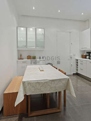 Very bright kitchen with windows facing the courtyard