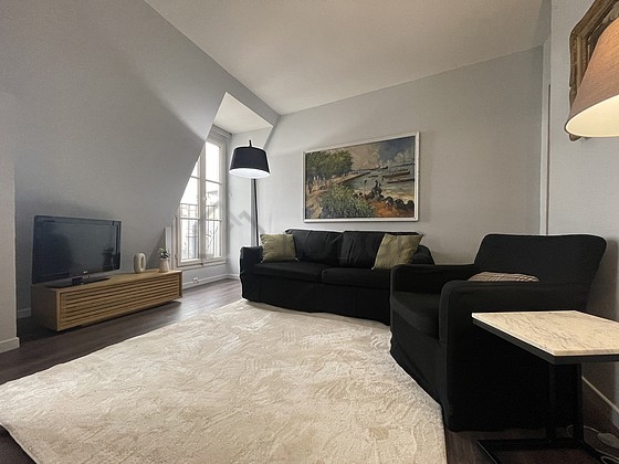 Living room with double-glazed windows and balcony