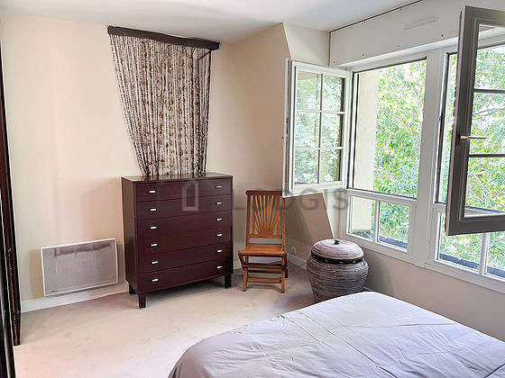 Bedroom with double-glazed windows facing the garden