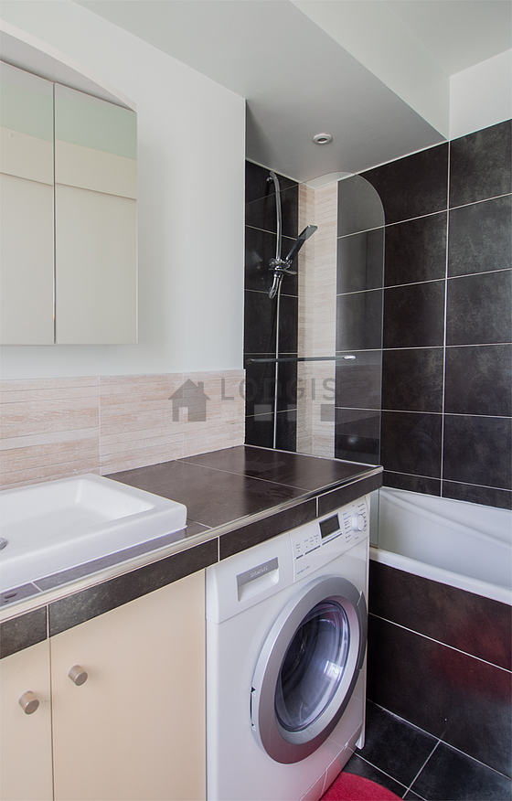 Pleasant and bright bathroom with tile floor