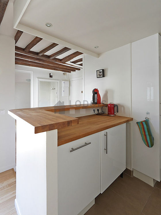 Kitchen equipped with dishwasher, hob, refrigerator, freezer