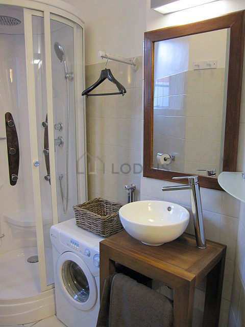 Beautiful and bright bathroom with windows and with tile floor
