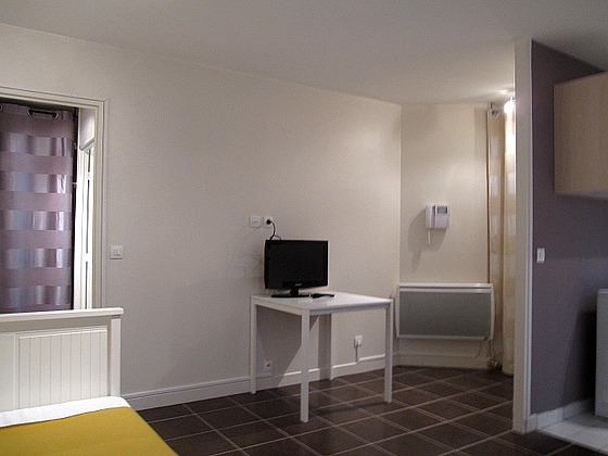 Living room with tile floor