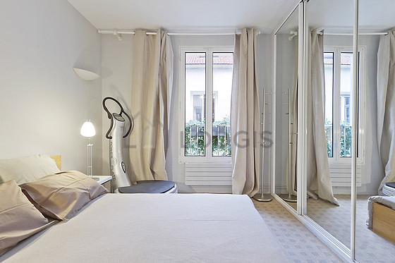 Bedroom with double-glazed windows facing the courtyard