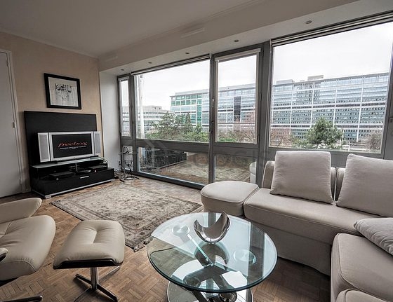 Living room with windows facing the garden
