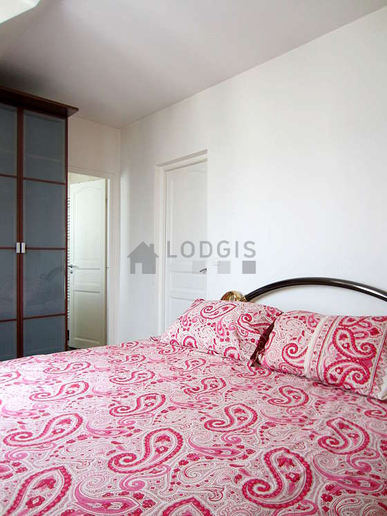 Bedroom with wooden floor
