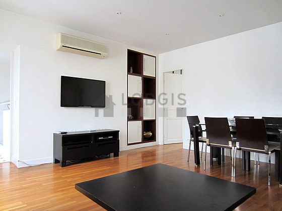 Very quiet living room furnished with air conditioning, tv, hi-fi stereo, cupboard