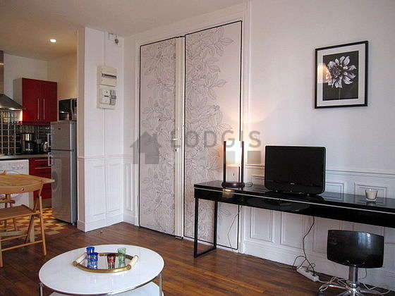 Quiet living room furnished with 1 sofabed(s) of 140cm, tv, hi-fi stereo, wardrobe