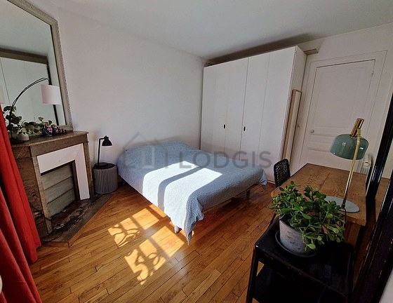 Bedroom with wooden floor