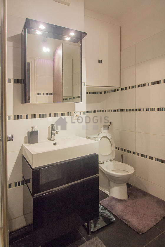 Pleasant and bright bathroom with tile floor