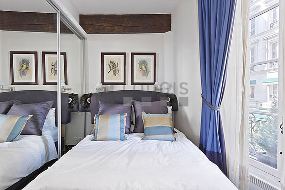 Bedroom with wooden floor