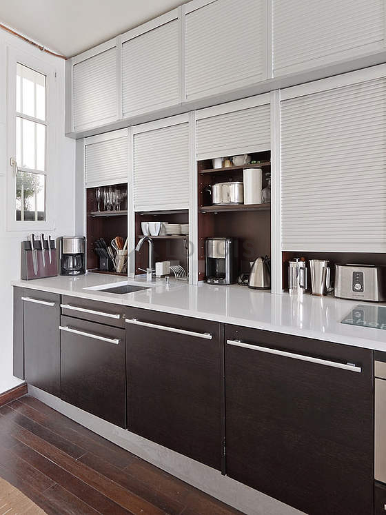 Kitchen equipped with washing machine, dryer, refrigerator, freezer