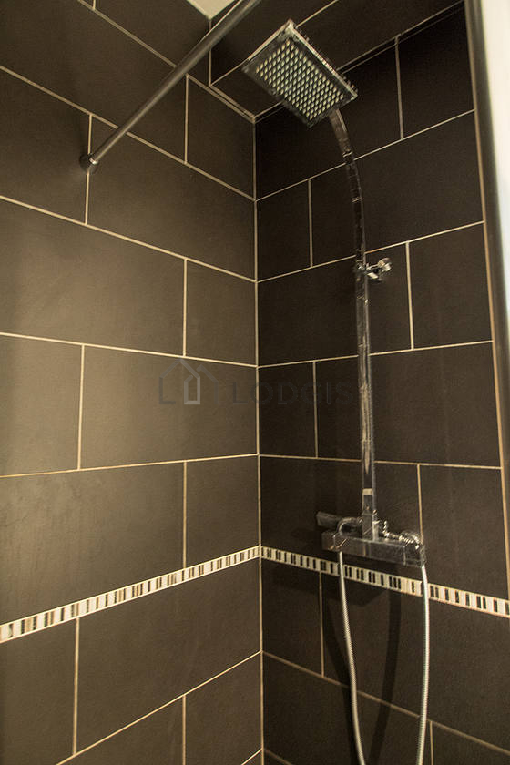 Bathroom equipped with washing machine, bath towels