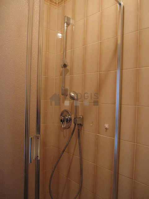 Bathroom equipped with washing machine, bath towels