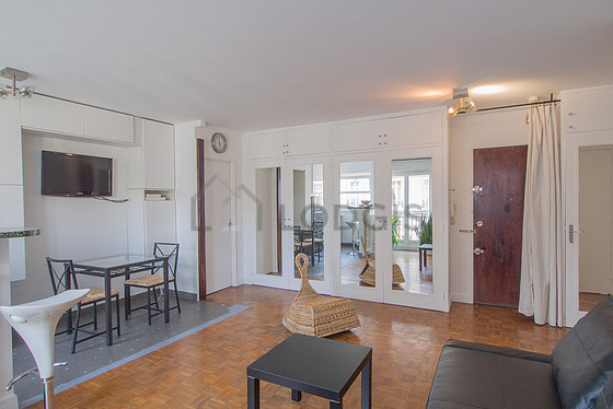 Living room with double-glazed windows facing the road