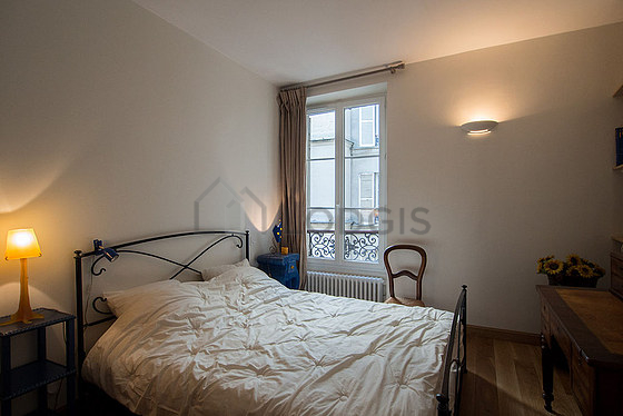 Bedroom with wooden floor